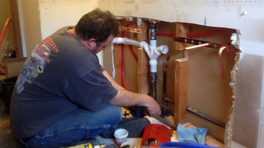Plumber at work